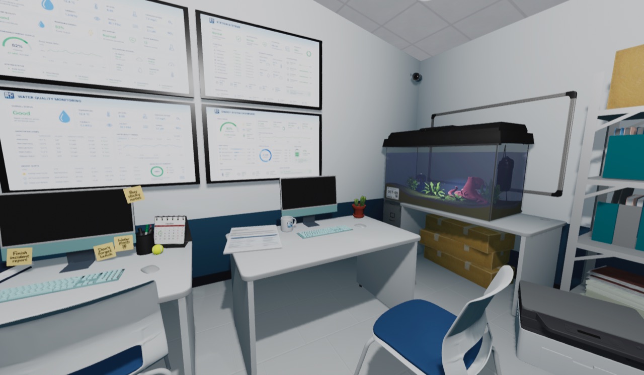 The data office, lit by monitors and an aquarium
